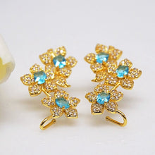 Load image into Gallery viewer, Light Blue Aquamarine Flower Studs - Enumu