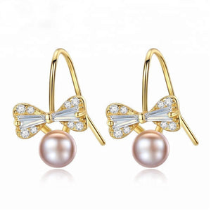 Sterling Silver Small Ribbon Natural Pearl Studs - Enumu