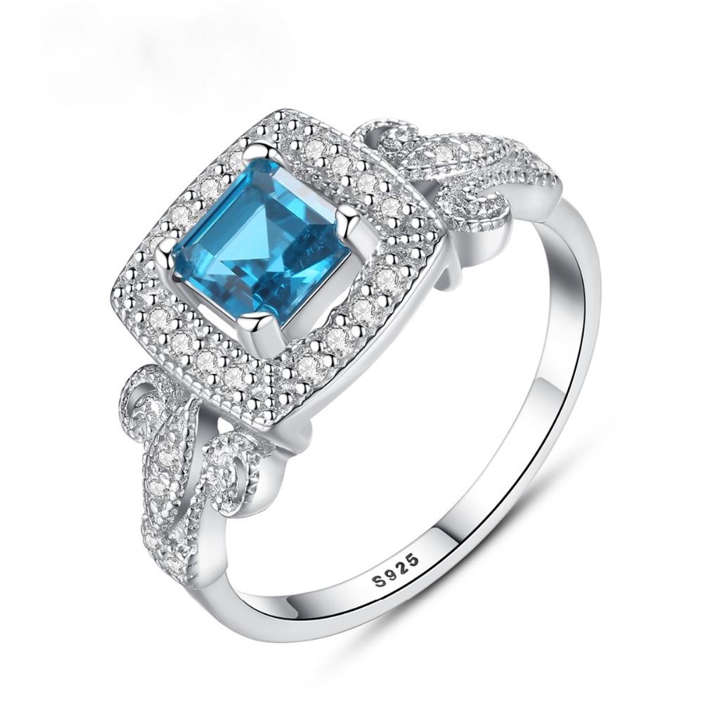 Pure 92.5 Sterling Silver Designer CZ & Blue Topaz Ring – Enumu
