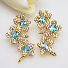 Load image into Gallery viewer, Light Blue Aquamarine Flower Studs - Enumu